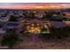Aerial view of a residential home with desert landscaping and backyard pool at 3488 N Lady Lake Ln, Casa Grande, AZ 85122