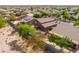 From above, see a home with a backyard pool and covered patio, perfect for entertaining at 3488 N Lady Lake Ln, Casa Grande, AZ 85122