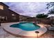 Expansive backyard featuring a private pool, desert landscaping, and a relaxing outdoor space at 3488 N Lady Lake Ln, Casa Grande, AZ 85122