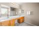 Bathroom with double sinks, ample counter space, and a shower at 3488 N Lady Lake Ln, Casa Grande, AZ 85122