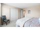 Bedroom with a soft patterned quilt and direct access to an additional room at 3488 N Lady Lake Ln, Casa Grande, AZ 85122