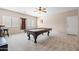 Game room featuring a classic billiard table, recessed lighting, and windows for natural light at 3488 N Lady Lake Ln, Casa Grande, AZ 85122