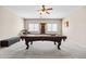 Game room featuring a classic billiard table, perfect for entertaining Gathering and friends at 3488 N Lady Lake Ln, Casa Grande, AZ 85122