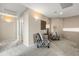 Cozy loft area with seating, neutral paint, and decorative lighting at 3488 N Lady Lake Ln, Casa Grande, AZ 85122
