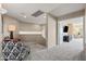 Bright loft with plush seating, soft lighting, and open space to relax at 3488 N Lady Lake Ln, Casa Grande, AZ 85122
