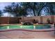 Sparkling pool with a rock waterfall, and decorative accent lighting at 3488 N Lady Lake Ln, Casa Grande, AZ 85122