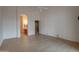 Bedroom with wood floors, a ceiling fan, and an en suite bathroom at 4017 W Irma Ln, Glendale, AZ 85308