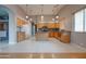 Spacious eat-in kitchen boasts oak cabinets, island, and stainless appliances at 4017 W Irma Ln, Glendale, AZ 85308