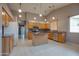 Spacious kitchen with a large island, oak cabinetry and stainless appliances at 4017 W Irma Ln, Glendale, AZ 85308