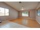 Spacious living area featuring tile, laminate flooring and natural light at 4017 W Irma Ln, Glendale, AZ 85308