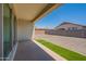 A spacious backyard includes an area of artificial turf and a covered patio, great for relaxing at 4467 S 116Th Ln, Avondale, AZ 85323