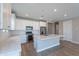 Modern kitchen showcasing white cabinetry, stainless steel appliances, and a stylish center island at 4467 S 116Th Ln, Avondale, AZ 85323