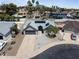 Aerial view of a single-Gathering home featuring a gray roof with solar panels and desert landscaping at 4632 E Kachina Trl, Phoenix, AZ 85044