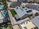Aerial view of a home with a backyard featuring an artificial lawn and shaded patio at 4632 E Kachina Trl, Phoenix, AZ 85044