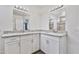 Bathroom featuring double sinks, granite countertops, modern lighting, and new tile at 4632 E Kachina Trl, Phoenix, AZ 85044