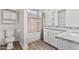 Bright bathroom with modern finishes, granite countertops, custom tiled shower, and modern fixtures at 4632 E Kachina Trl, Phoenix, AZ 85044