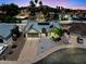 Charming single-Gathering home featuring a two-car garage, solar panels, and desert landscaping at 4632 E Kachina Trl, Phoenix, AZ 85044