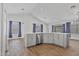 Open-concept living space flows into the kitchen, featuring stainless steel appliances and ample counter space at 4632 E Kachina Trl, Phoenix, AZ 85044