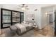 Serene bedroom with natural light, a ceiling fan, neutral decor, and modern furnishings at 4808 N 24Th St # 231, Phoenix, AZ 85016
