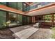 Private outdoor patio area with tiled flooring and comfortable seating, great for relaxation at 4808 N 24Th St # 231, Phoenix, AZ 85016