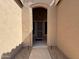 Inviting entryway showcasing a security door and stylish lighting fixtures at 4944 E Villa Theresa Dr, Scottsdale, AZ 85254