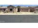 Southwest-style home featuring desert landscaping and a two-car garage at 4944 E Villa Theresa Dr, Scottsdale, AZ 85254