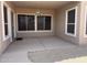 Covered patio with concrete floors, ceiling fan and large windows at 4944 E Villa Theresa Dr, Scottsdale, AZ 85254