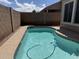 A private outdoor pool with a cleaning system and view of the backyard at 4944 E Villa Theresa Dr, Scottsdale, AZ 85254