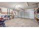 Spacious garage with a large garage door and room for storage at 4953 W Acoma Dr, Glendale, AZ 85306