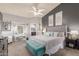 Serene main bedroom featuring a king-sized bed, ensuite bathroom, and stylish decor at 4953 W Acoma Dr, Glendale, AZ 85306