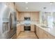 Well-equipped kitchen with stainless steel appliances, ample cabinet space, and sleek countertops at 5201 N 24Th St # 107, Phoenix, AZ 85016