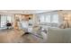 Bright and inviting living room featuring light wood floors, modern furnishings, and an open layout at 5201 N 24Th St # 107, Phoenix, AZ 85016