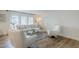 Bright living room featuring a comfortable sofa, accent chairs, stylish decor, and natural light at 5201 N 24Th St # 107, Phoenix, AZ 85016