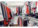 Walk-in closet with organized storage solutions and ample hanging space at 5210 W Ironwood Dr, Glendale, AZ 85302