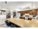 Spacious kitchen with a large breakfast bar and ample cabinet space at 5210 W Ironwood Dr, Glendale, AZ 85302