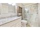 Modern bathroom featuring a glass-enclosed shower and stylish vanity with granite countertop at 5735 E Mcdowell Rd # 67, Mesa, AZ 85215