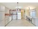 Spacious kitchen featuring updated appliances and ample storage, perfect for cooking at 5735 E Mcdowell Rd # 67, Mesa, AZ 85215