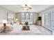 Bright living room featuring stylish decor and plenty of natural light from the windows at 5735 E Mcdowell Rd # 67, Mesa, AZ 85215