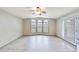 Airy living room with beautiful windows and modern floors, ready for personalization at 5735 E Mcdowell Rd # 67, Mesa, AZ 85215