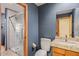 Well-lit bathroom with a glass shower, granite countertop, and classic fixtures at 6524 E Rockaway Hills Dr, Cave Creek, AZ 85331