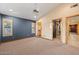 Large bedroom with ceiling fan, walk-in closet, and en-suite bathroom at 6524 E Rockaway Hills Dr, Cave Creek, AZ 85331