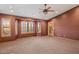 Bedroom has carpet, unique windows, and natural lighting at 6524 E Rockaway Hills Dr, Cave Creek, AZ 85331