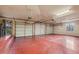Spacious four-car garage with new epoxy flooring and high ceilings at 6524 E Rockaway Hills Dr, Cave Creek, AZ 85331