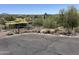 Arizona horse property with a covered area and fenced lot has plenty of potential at 6524 E Rockaway Hills Dr, Cave Creek, AZ 85331