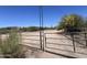 Arizona horse property has a fenced-in lot with a gate leading to the home at 6524 E Rockaway Hills Dr, Cave Creek, AZ 85331