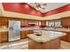 Spacious kitchen showcasing granite countertops, wooden cabinets, and stainless steel appliances at 6524 E Rockaway Hills Dr, Cave Creek, AZ 85331