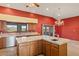 Well-appointed kitchen with granite countertops, stainless steel appliances, and beautiful views at 6524 E Rockaway Hills Dr, Cave Creek, AZ 85331
