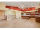 Open living room leading to a kitchen with a view at 6524 E Rockaway Hills Dr, Cave Creek, AZ 85331