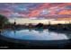 The large swimming pool features rock accents and built in waterfalls at 6524 E Rockaway Hills Dr, Cave Creek, AZ 85331