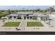 Stunning aerial view showcasing a modern home with meticulous landscaping at 6614 E North Ln, Paradise Valley, AZ 85253